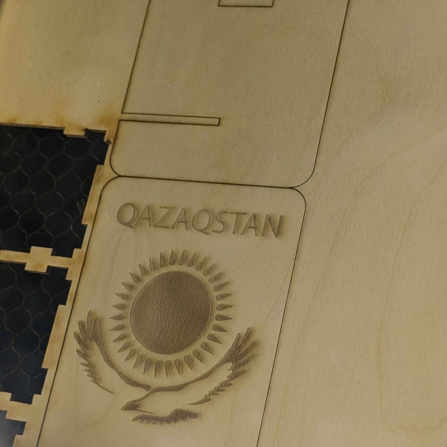 More process photos of the laser cutting.