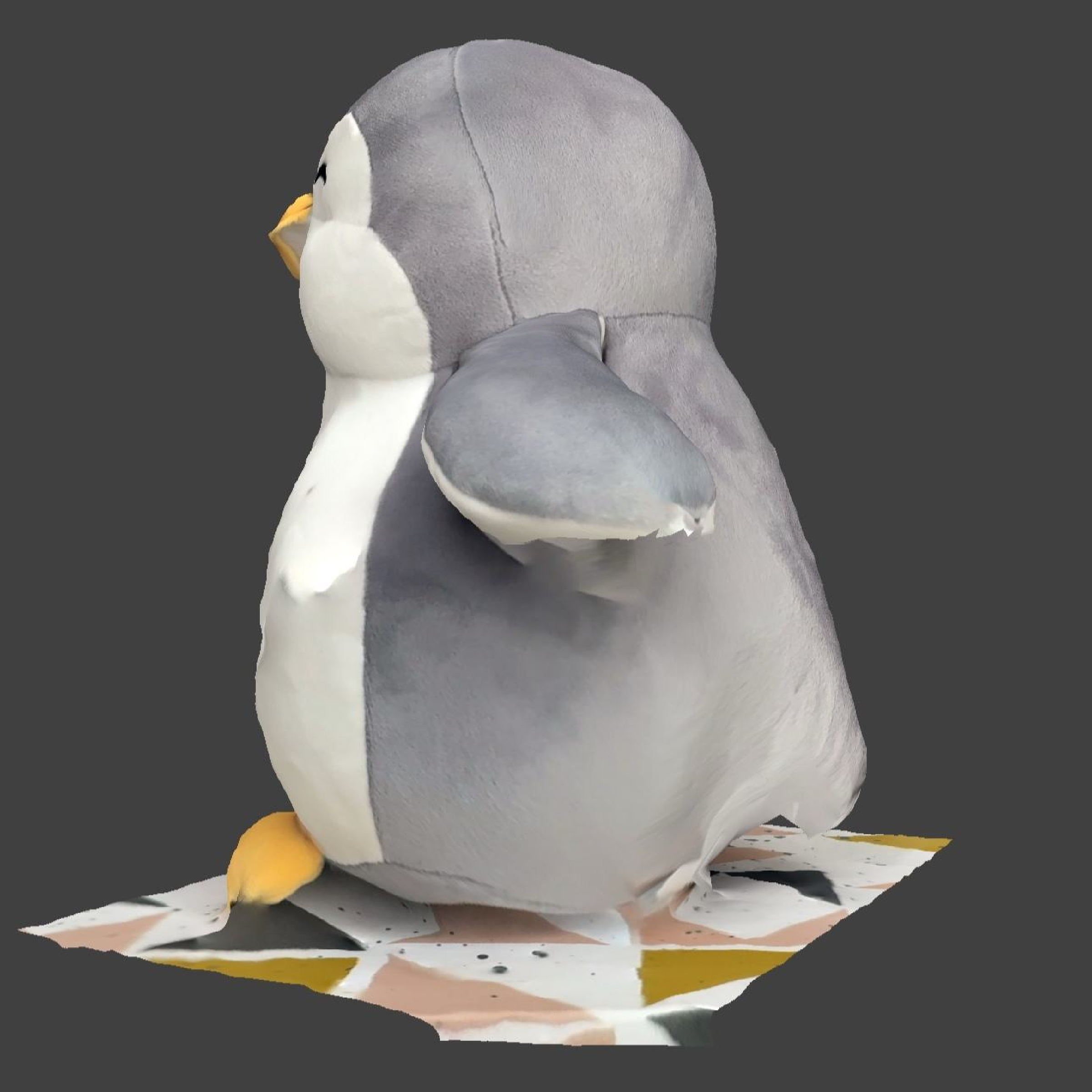 This side doesn't look too bad, until you see the dent in his butt. Sorry Mr Penguin!